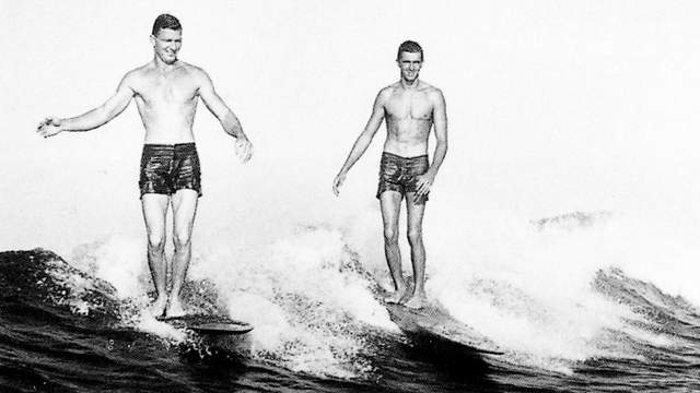 George Downing (right) and Wally Froiesth, Waikiki, around 1950. Photo: Clarence Maki