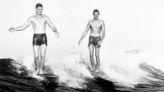 George Downing (right) and Wally Froiesth, Waikiki, around 1950. Photo: Clarence Maki