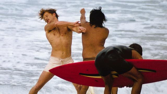 Beach fight, Hawaii, mid 1970s. Photo: Dan Merkel