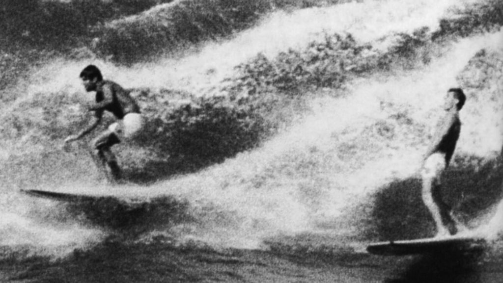 Mike Hynson and Miki Dora surfing in Hawaii