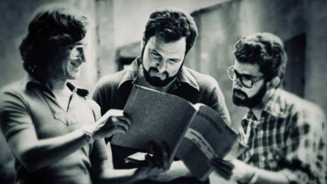 John Milius (center) with Steven Spielberg (left) and George Lucas