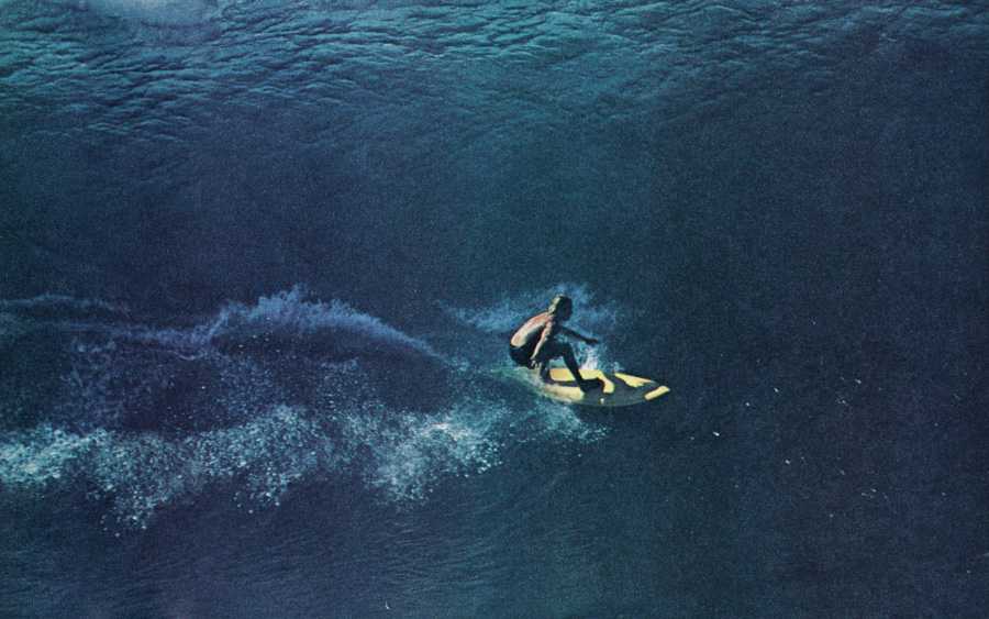 Rick Rasmussen, surfing double-overhead Pipeline, 1975.