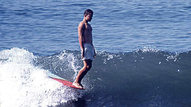 Corky Carroll surfing in Katin trunks, 1966. Photo: Ron Stoner