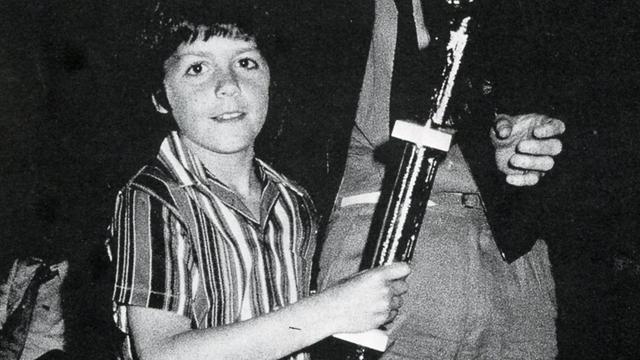 Nicky Wood, age 12, with godfather Mark Richards