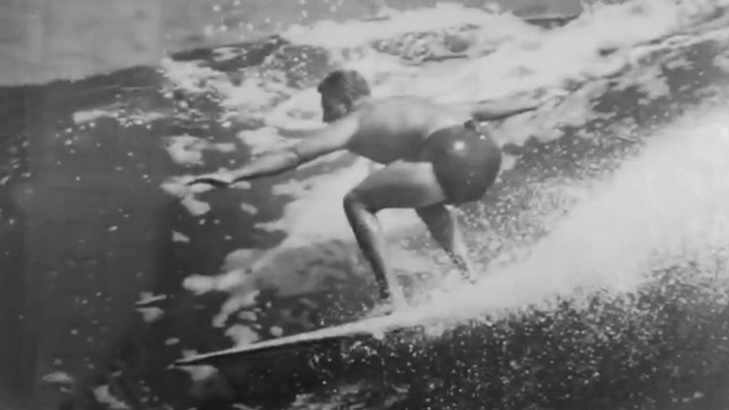 Ned Eckert surfing at Malibu in 1960