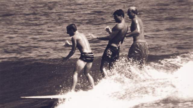 (L to R) Mickey Munoz, Miki Dora, Mike Doyle, Malibu, 1959. Photo: John Severson