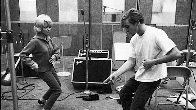 Beach Boys' drummer Dennis Wilson, stomping between takes