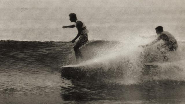 Jackie Baxter (left) and Miki Dora, Malibu, 1965. Photo: LeRoy Grannis