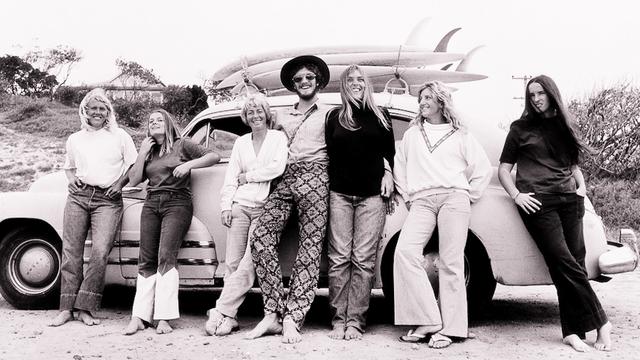 Nat Young with Phyllis O'Donell (to Nat's right) and Judy trim (to Nat's left), 1972. Photo: John Witzig
