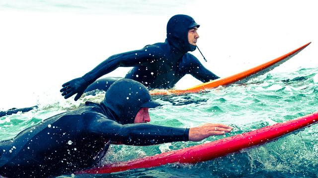Gerard Bulter (bottom) and pro surfer Greg Long, from Chasing Mavericks