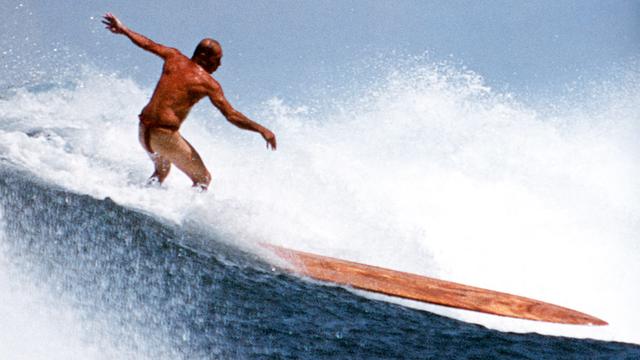 Tom Stone on olo board, 2008. Photo: David Pu'u