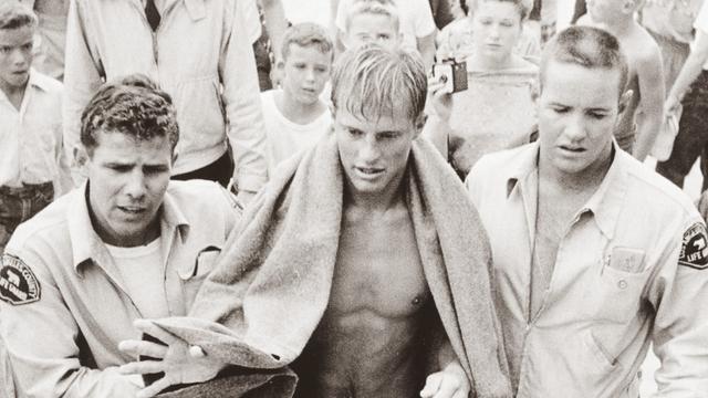 Ricky Grigg, after winning 1955 Catalina-to-Manhattan paddleboard race. Photo: Leigh Wiener