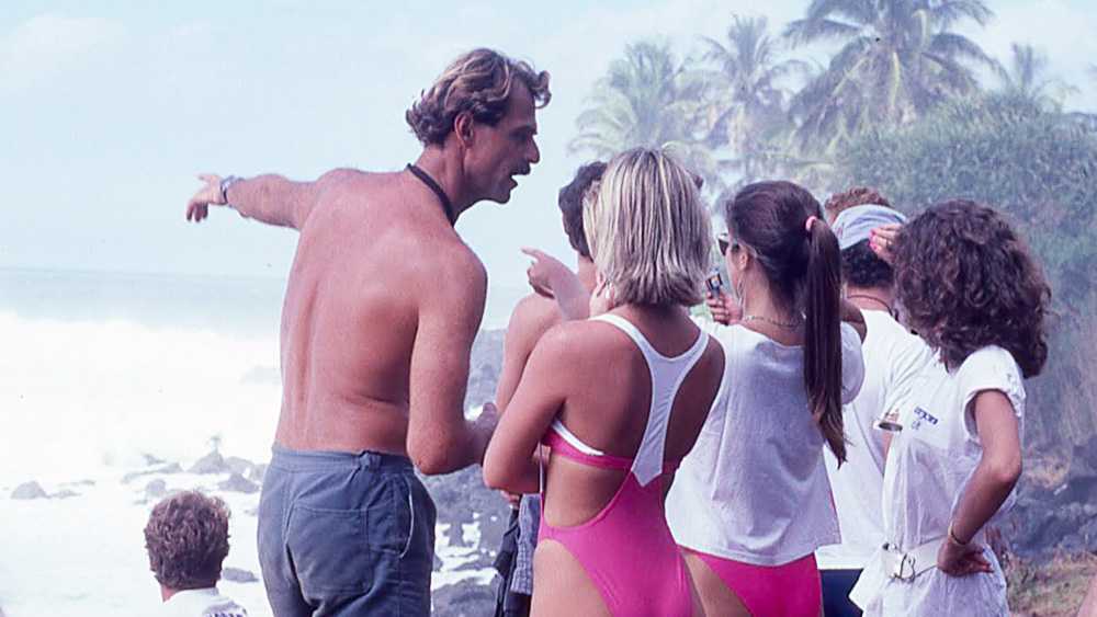 surf filmmaker jack mccoy at waimea bay in hawaii