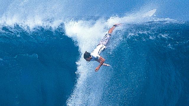 Over the falls at Teahupoo. Photo: Brian Bielmann