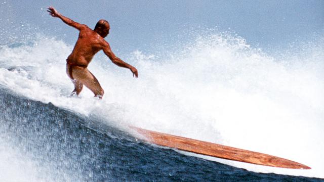 Tom Stone on olo board, 2008. Photo: David Pu'u