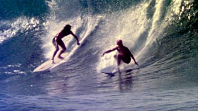 Purpus and Lopez, Sharing at Pipeline, 1975