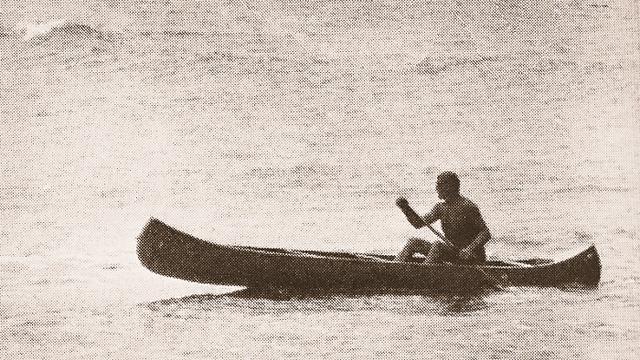 Don Golden, canoe surfing in Southern California, 1965