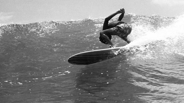 Head dip, Waikiki, 1960. Photo: John Seveson