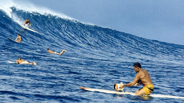 Photographer Don James in the channel at Sunset Beach, 1966. Photo: LeRoy Grannis