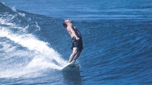 Shawn Briley glides into the channel at Pipeline, 1995. Photo: Rick Doyle