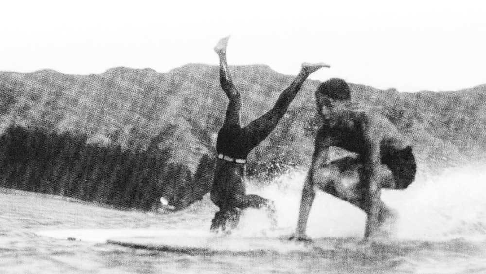 duke kahanamoku doing a headstand, waikiki, 1932
