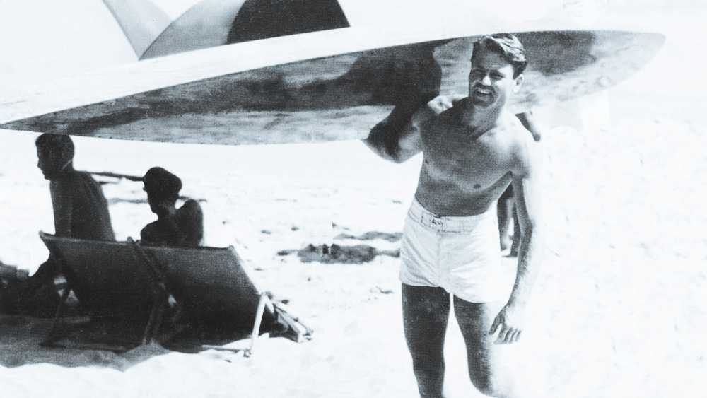 tom blake with a hollow surfboard