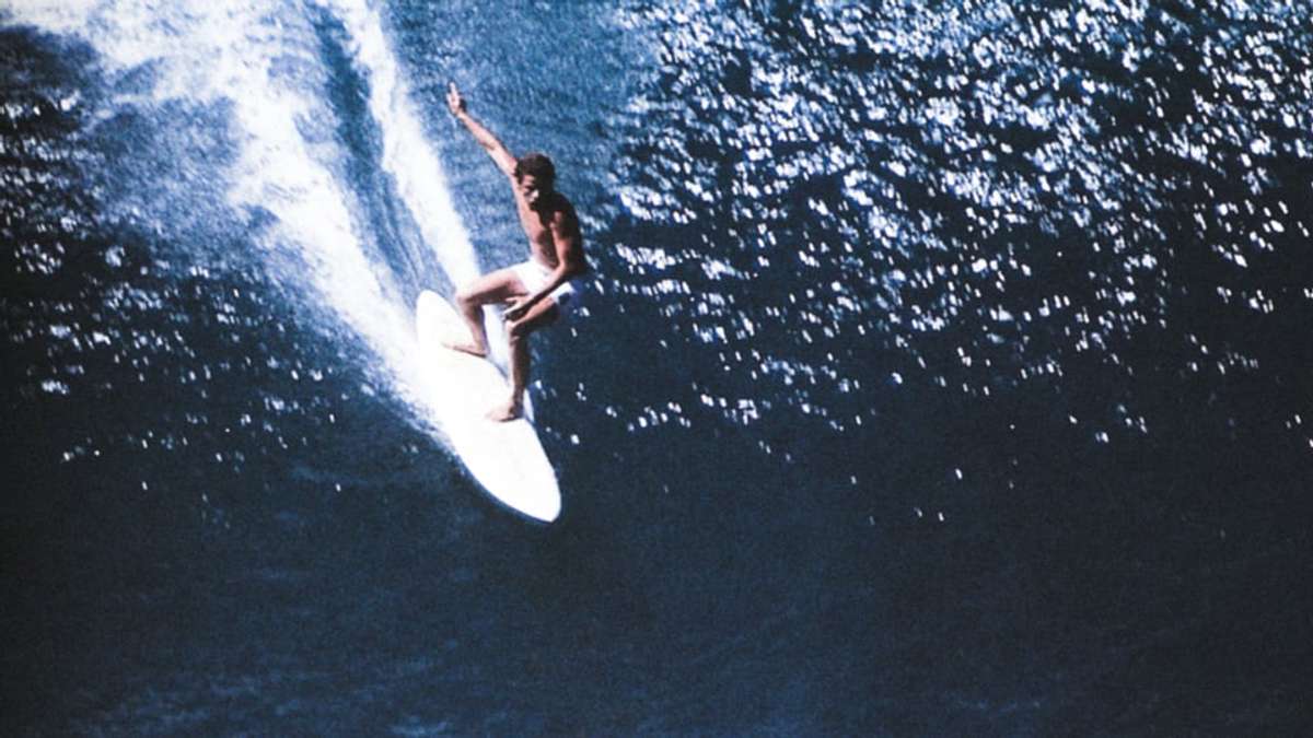 Wayne Rides Surfboard Wayne Bartholomew in