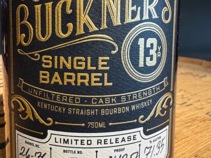 A single barrel label, hand-marked with barrel and bottle numbers