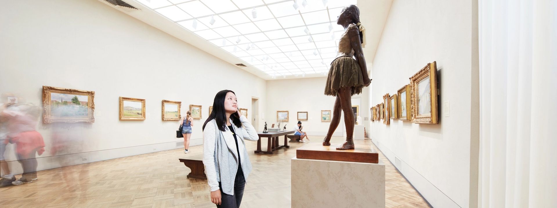 Visitor looking at Little Dancer, Aged Fourteen by Hilaire-Germain-Edgar Degas