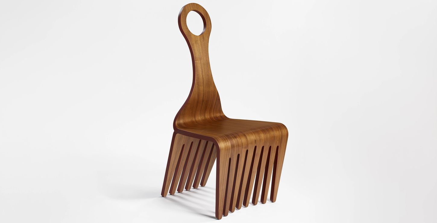 A chair made of walnut veneer, epoxy glue, satin finish, and paint.