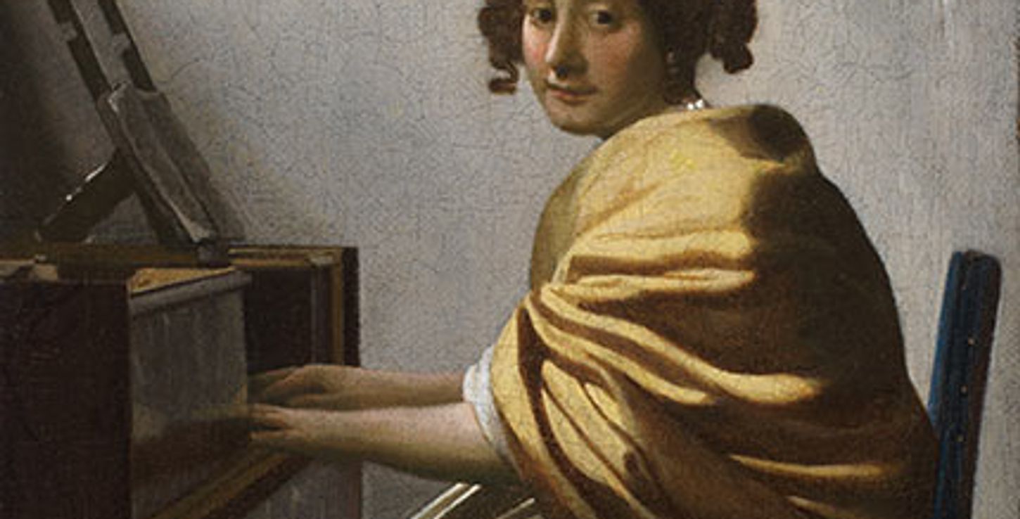 A Young Woman Seated at the Virginals by Johannes Vermeer