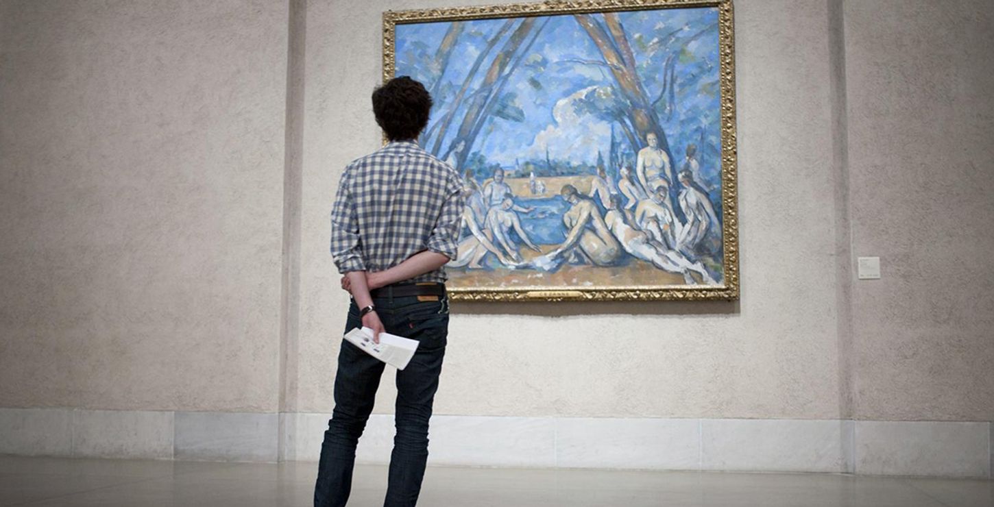 Visitor admiring The Large Bathers, 1900–1906, by Paul Cézanne, W1937-1-1