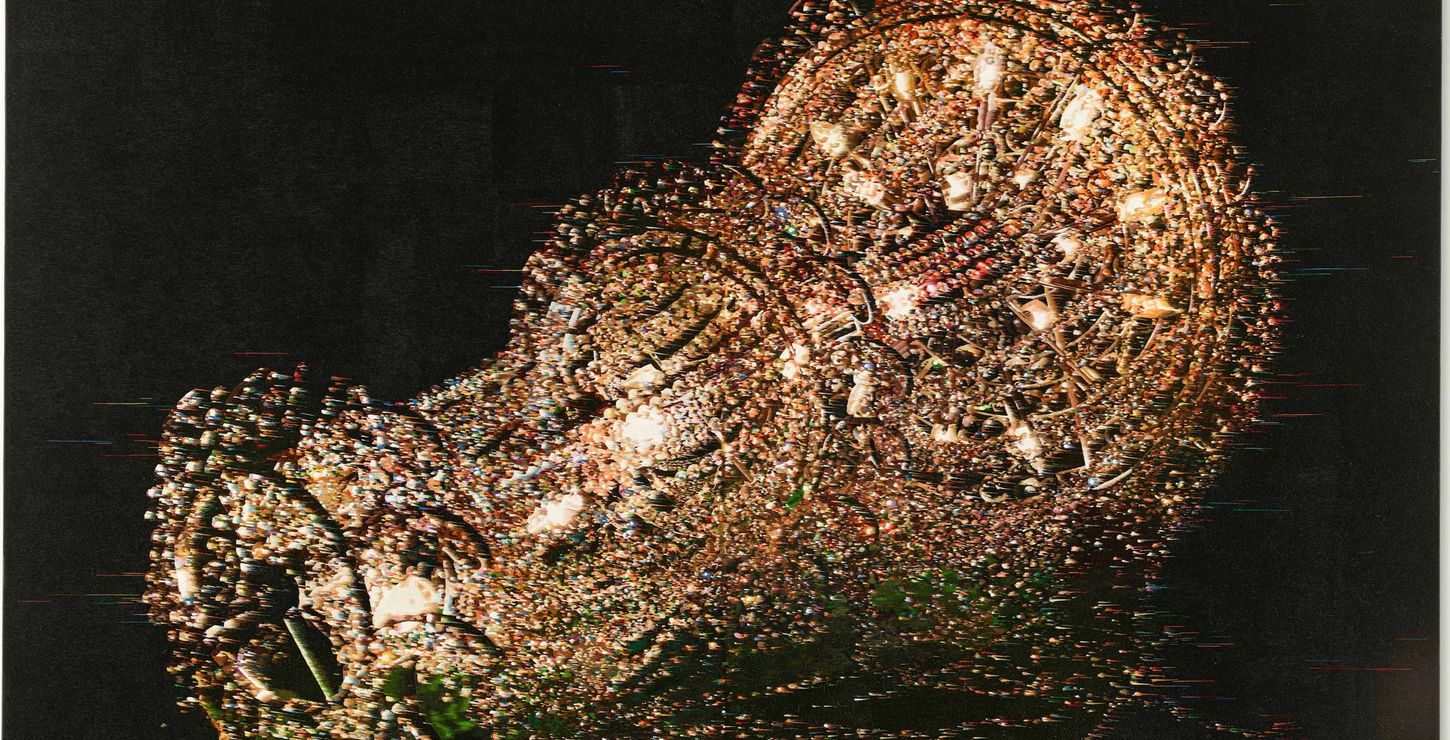 Large-scale needle paintings of a chandelier.