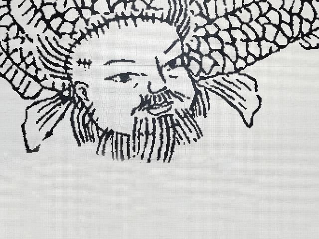 Embroidered self portrait of Wei Wei as a mythical Chinese creature.