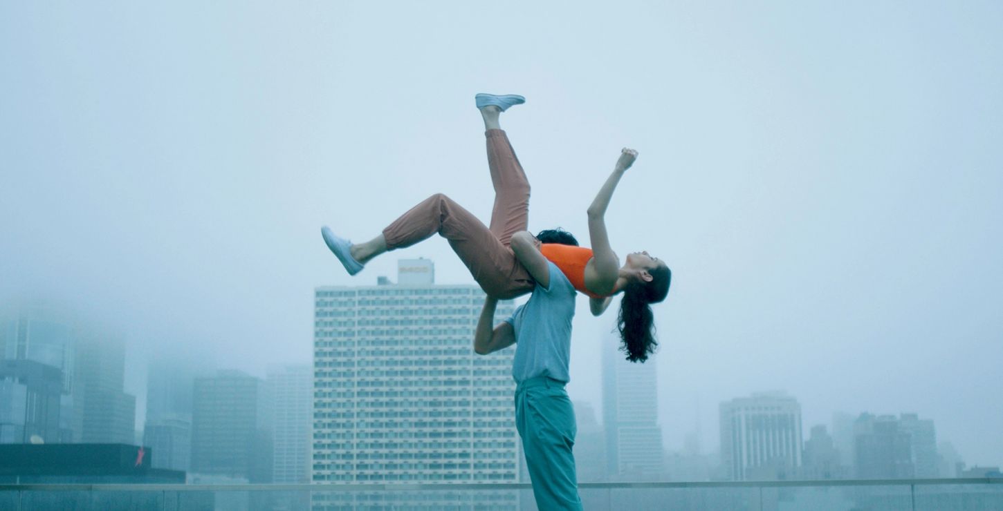 Still of Thays Golz and Zecheng Liang dancing from Moving Words.