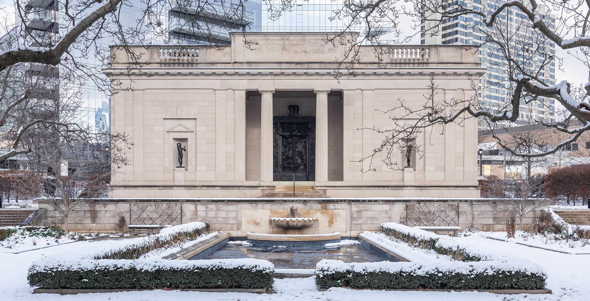 Photo of the exterior of the Rodin Museum in the snow.