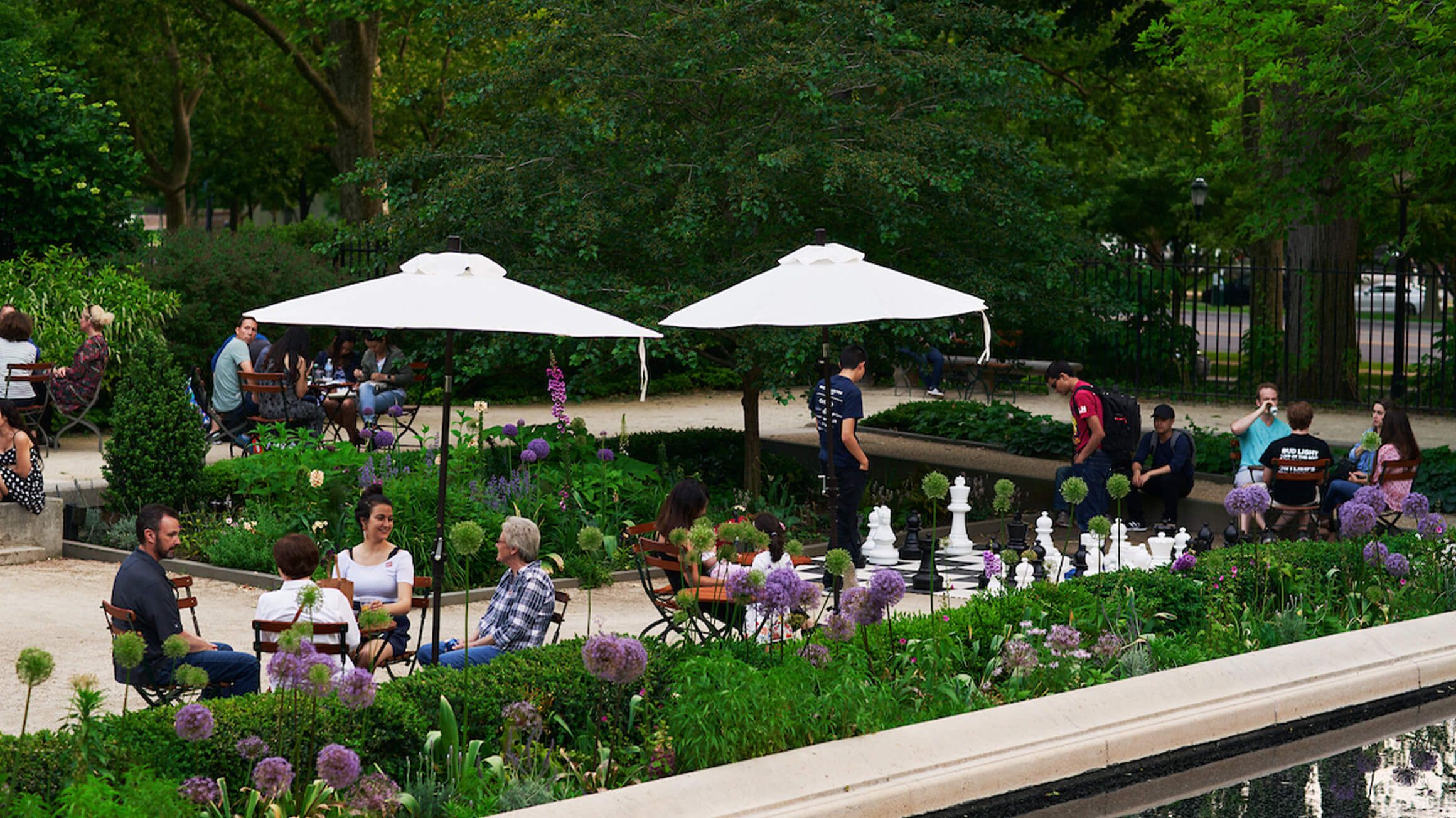Visitors enjoying the Rodin Garden Bar in spring