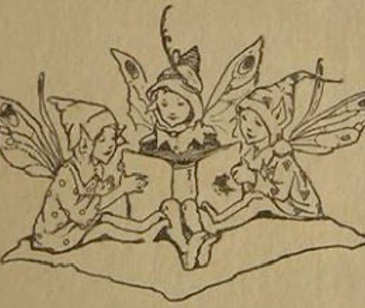 Fairies reading a book
