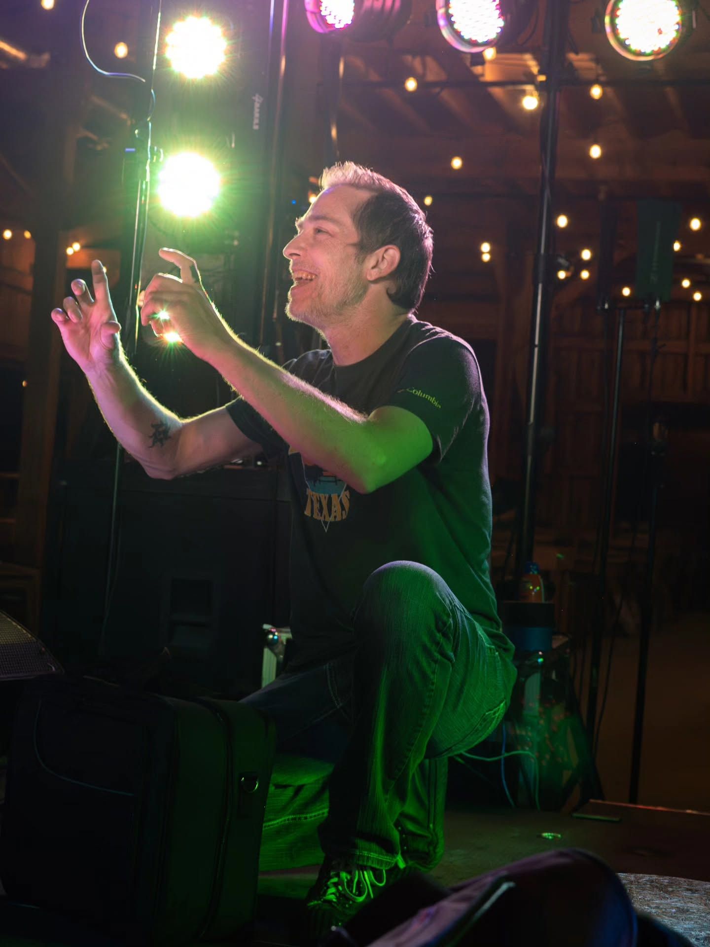 Lead vocals under stage lights