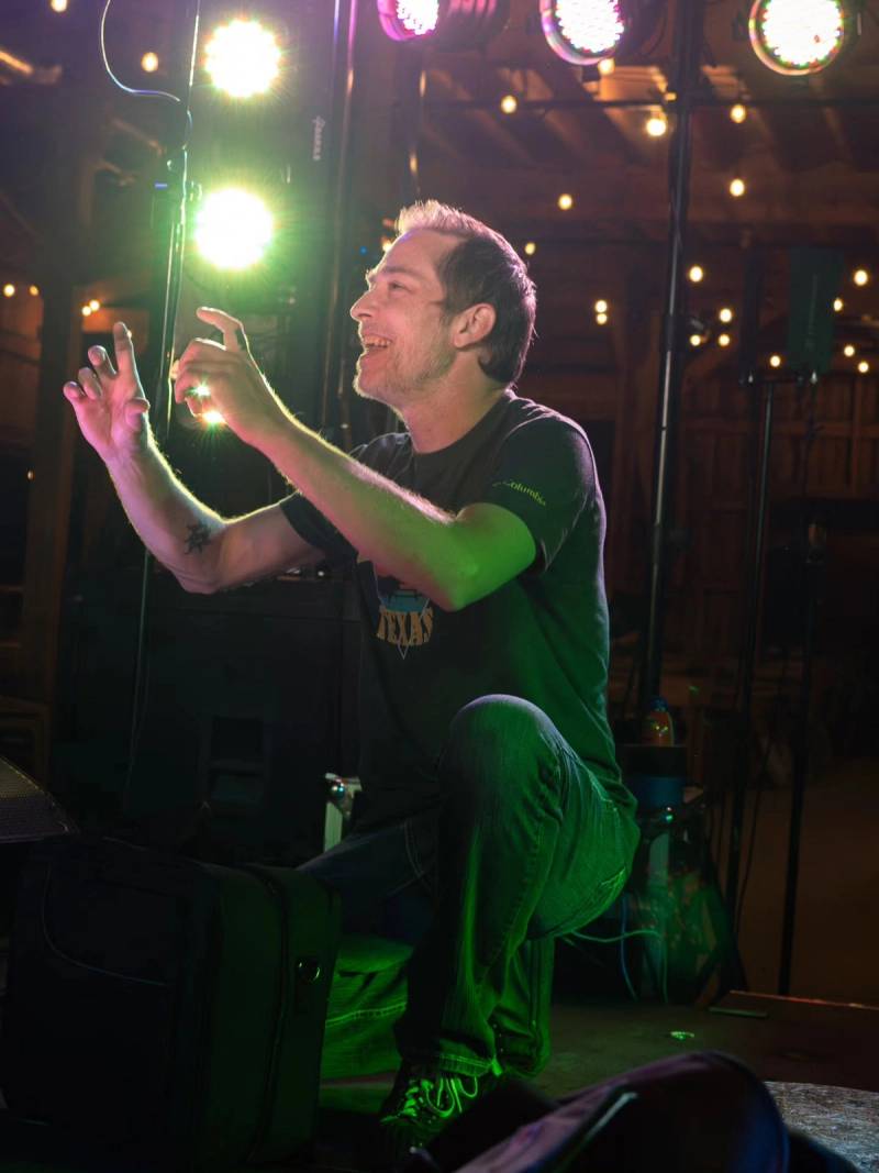 Lead vocals under stage lights
