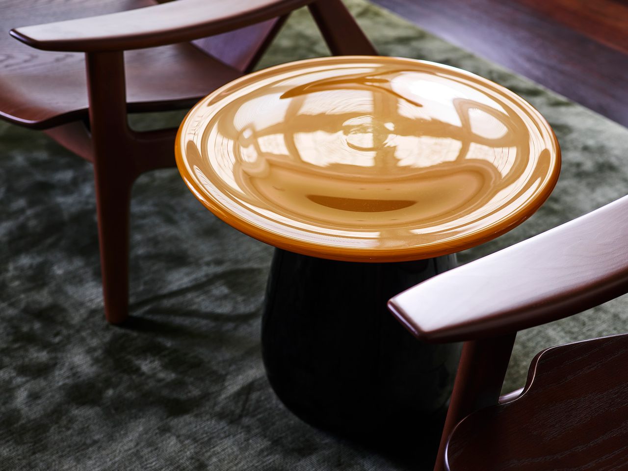 Detail of amber ceramic side table.