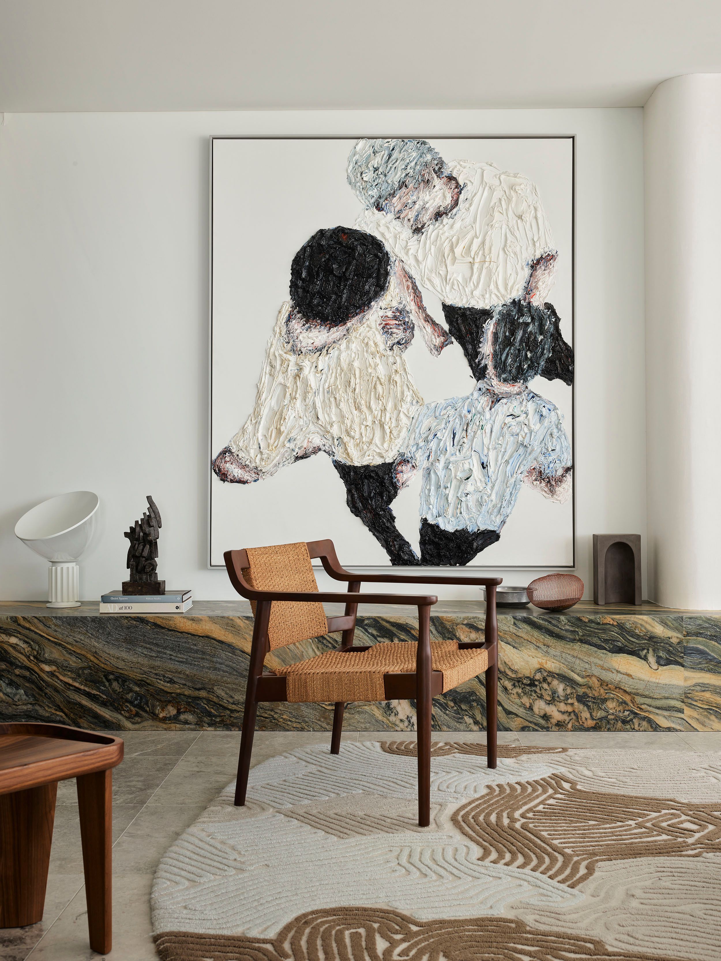 Cloud Surfer by Sydney interior design studio Decus, featuring a Clemens Krauss impasto artwork, woven timber armchair, richly veined stone plinth and textured rug.