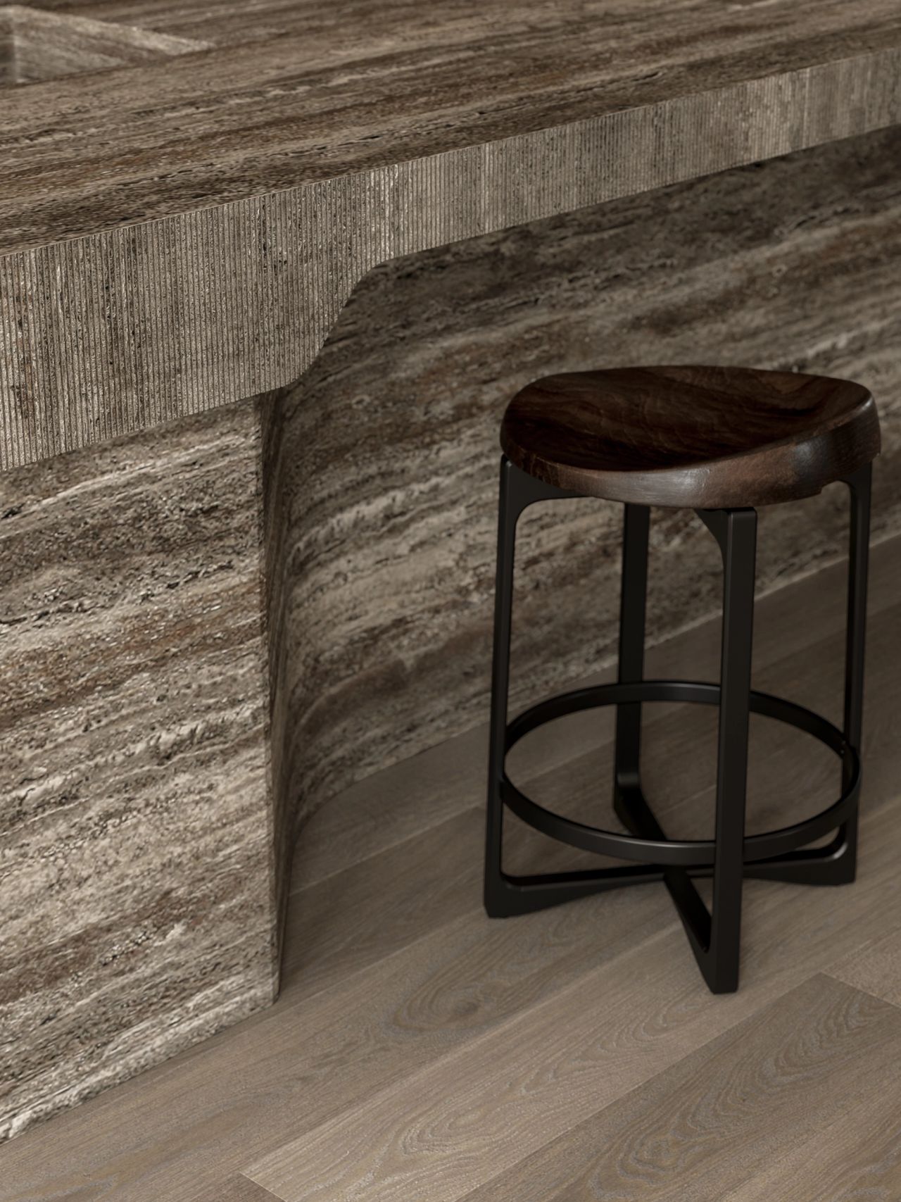 Sculptural natural stone kitchen island with fluted detailing.
