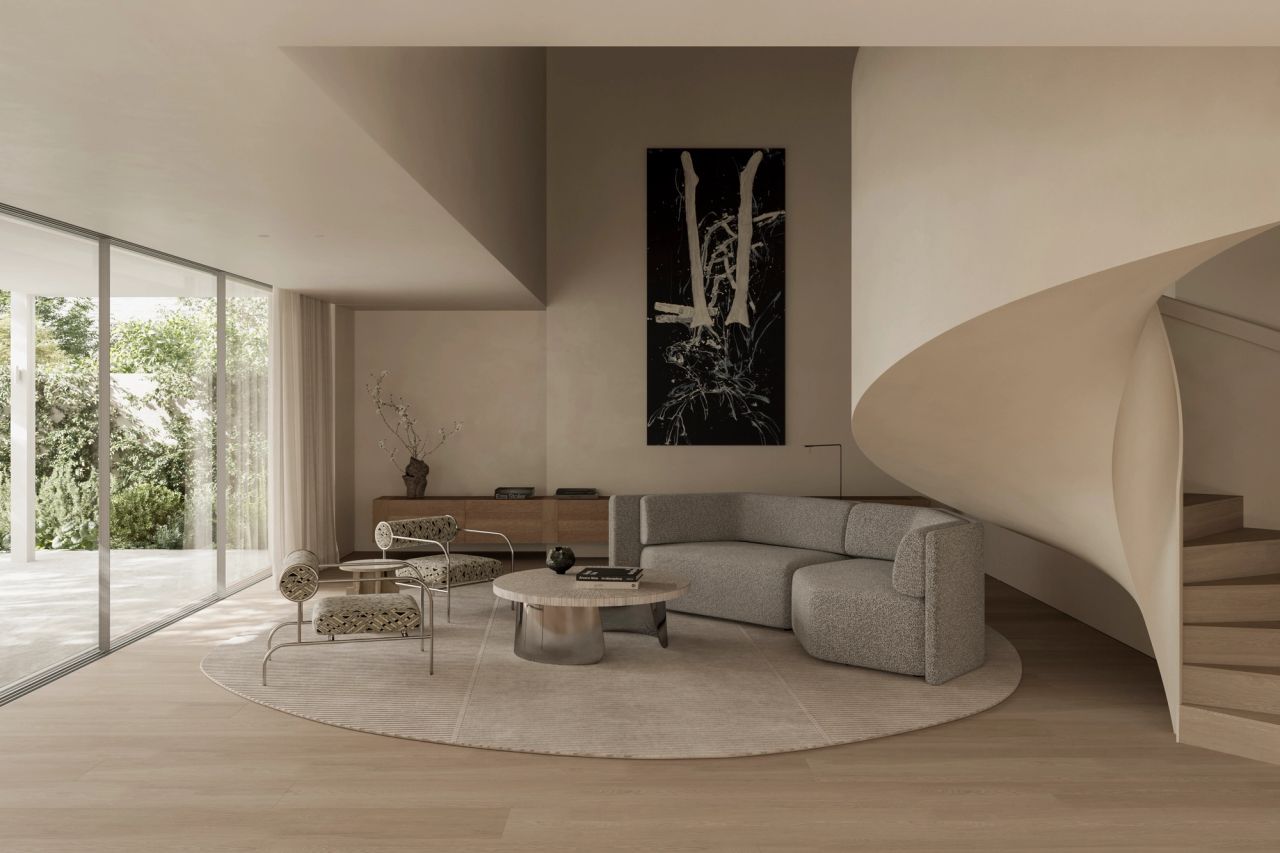 Park Double-height living room with a curved sculptural staircase, a tall abstract black-and-white artwork, a grey bouclé sofa, a low round coffee table, and floor-to-ceiling glass doors opening onto greenery