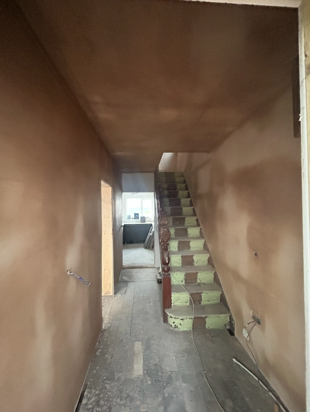 Plastered stairwell and hallway