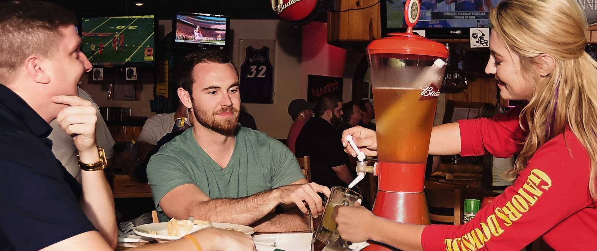 Friends at the bar watching the game