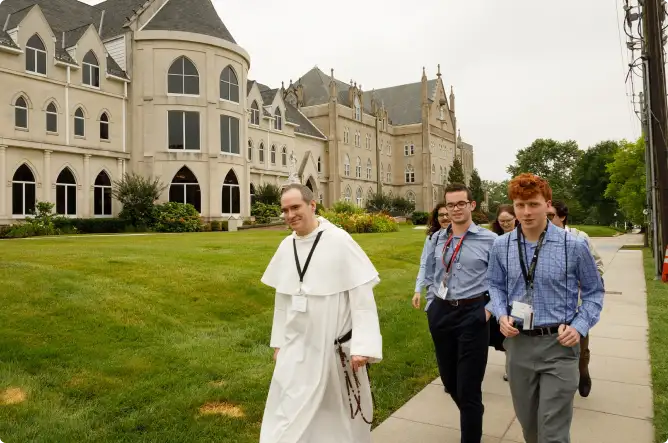People walking at the Thomistic Institute