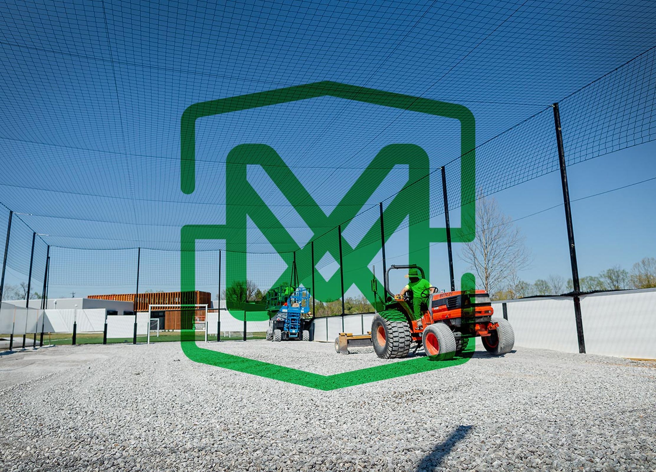 workers putting down sub layer of gravel