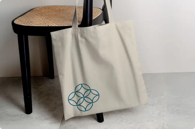 A tote bag with the RestoreMD logo