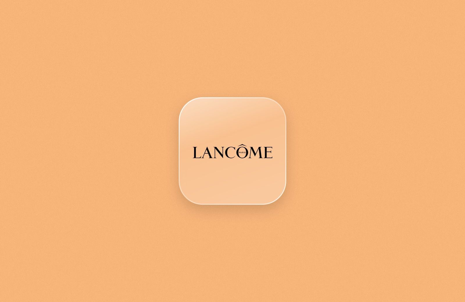 Lancôme logo on a frosted glass tile over a peach background